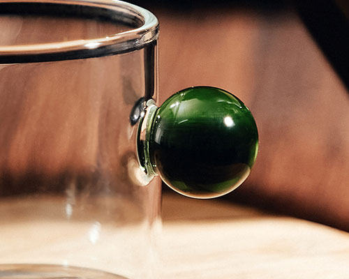 Small Glass Cup with Green Handle