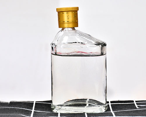 Flattened Clear Glass Wine Bottle